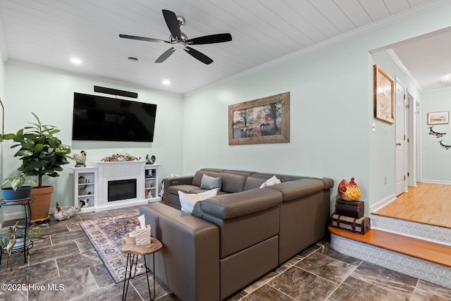 212 Park Ave, Southport, NC 28461 - living area featuring a ceiling fan, crown molding, recessed lighting, a glass covered fireplace, and wood ceiling
