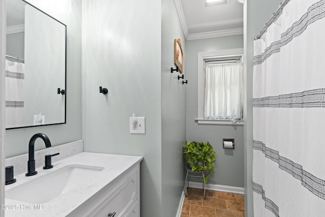 212 Park Ave, Southport, NC 28461 - bathroom featuring ornamental molding, baseboards, and vanity