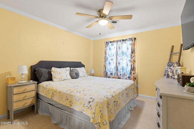 212 Park Ave, Southport, NC 28461 - bedroom with ornamental molding, light carpet, baseboards, and a ceiling fan