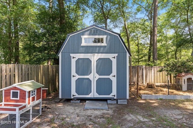 212 Park Ave, Southport, NC 28461 - view of shed with a fenced backyard and exterior structure