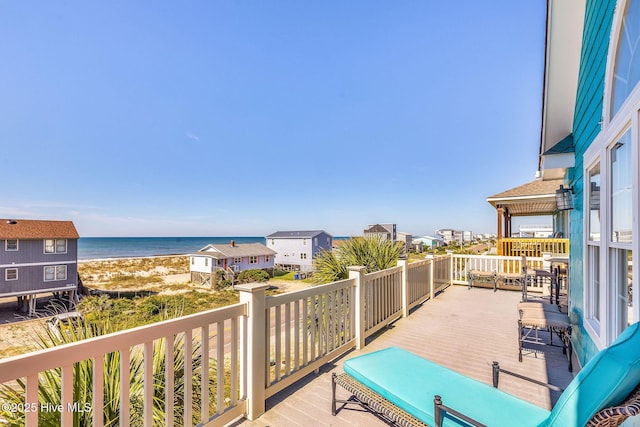 308 E Beach Dr, Oak Island, NC 28465 - deck with view of water and beach