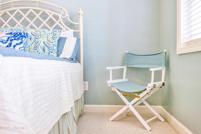 308 E Beach Dr, Oak Island, NC 28465 - bedroom featuring baseboards and carpet flooring