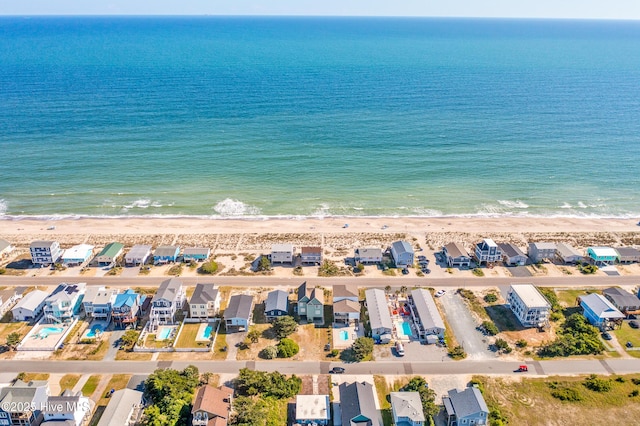 308 E Beach Dr, Oak Island, NC 28465 - aerial perspective of suburban area featuring waterfront with a beach