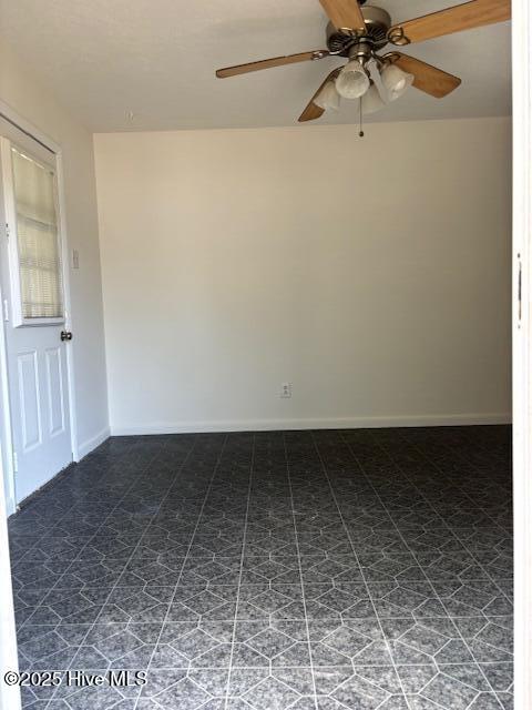 6007 Meadow Ln, Goldsboro, NC 27530 - unfurnished room with ceiling fan and baseboards