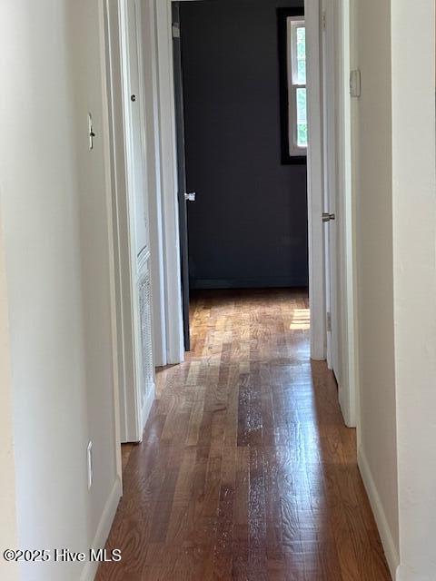 6007 Meadow Ln, Goldsboro, NC 27530 - hallway featuring wood finished floors and baseboards