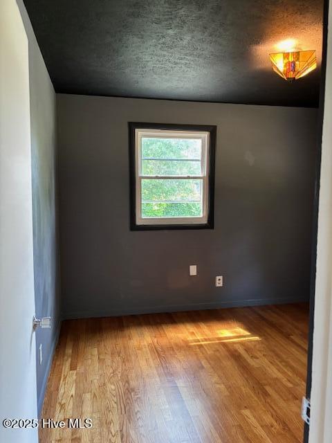 6007 Meadow Ln, Goldsboro, NC 27530 - unfurnished room with light wood finished floors and baseboards
