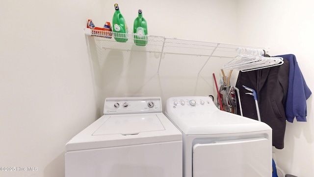washroom with washer and clothes dryer