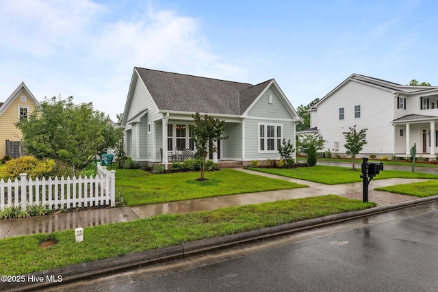 view of front of home featuring a porch and roof with shingles