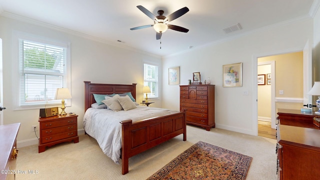 bedroom featuring light carpet, crown molding, baseboards, and a ceiling fan