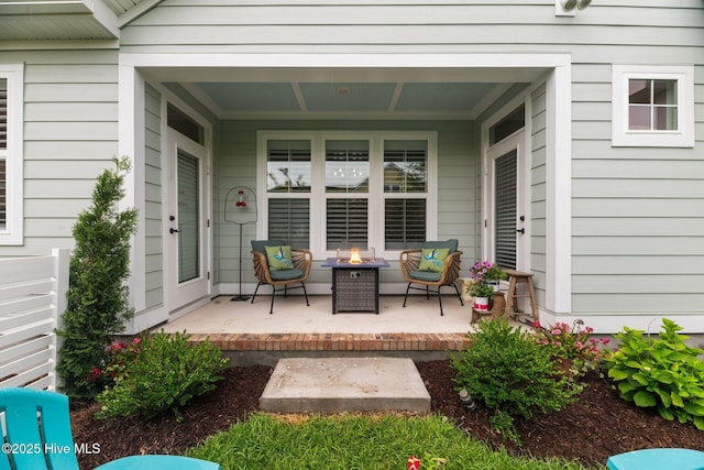 4083 Reunion Pointe Ln, New Bern, NC 28562 - view of patio featuring a fire pit