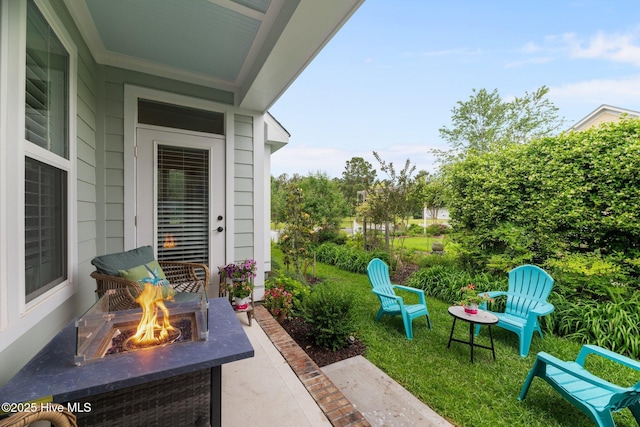 4083 Reunion Pointe Ln, New Bern, NC 28562 - view of patio / terrace with an outdoor fire pit