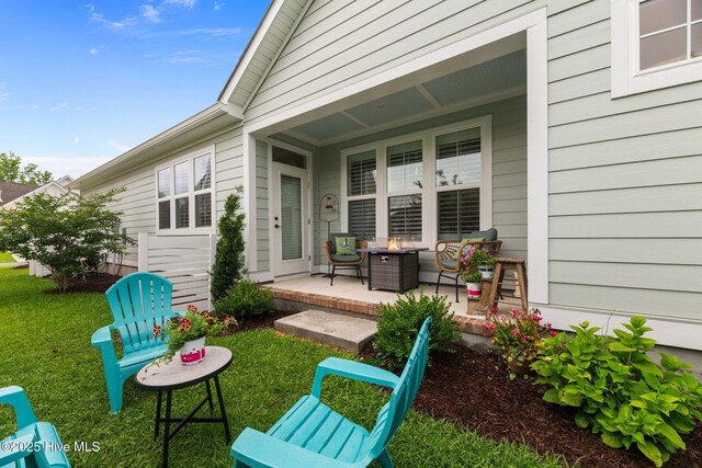 4083 Reunion Pointe Ln, New Bern, NC 28562 - view of patio / terrace featuring a fire pit