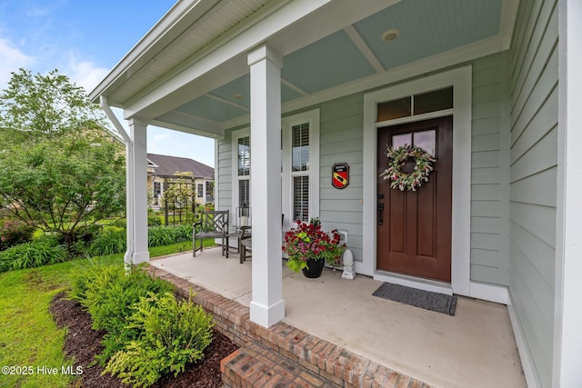 property entrance featuring a porch