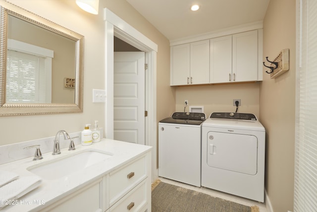297 Broad St, Oriental, NC 28571 - laundry area featuring washer and dryer, cabinet space, and recessed lighting