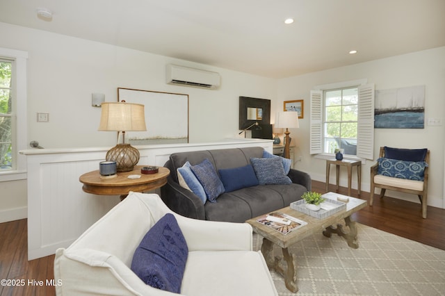 297 Broad St, Oriental, NC 28571 - living area with a wall mounted AC, baseboards, wood finished floors, and recessed lighting