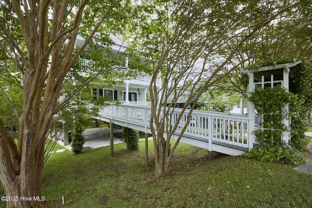 297 Broad St, Oriental, NC 28571 - back of property featuring a lawn and a deck