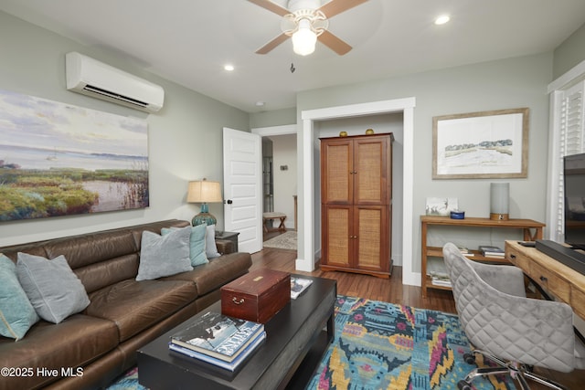 297 Broad St, Oriental, NC 28571 - living room with a wall mounted AC, ceiling fan, wood finished floors, recessed lighting, and baseboards