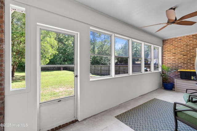205 Sand Dollar Ln, Hampstead, NC 28443 - unfurnished sunroom featuring ceiling fan and plenty of natural light