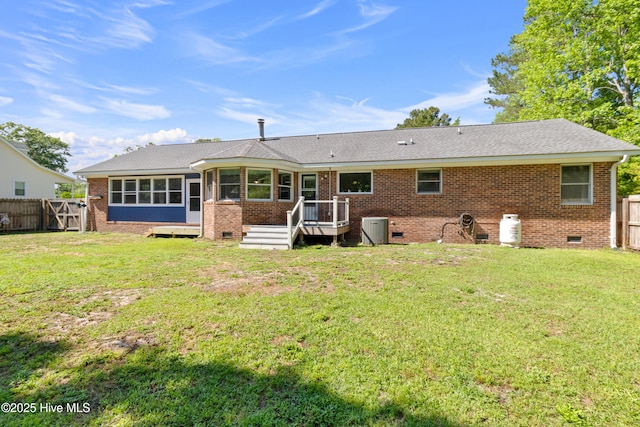 205 Sand Dollar Ln, Hampstead, NC 28443 - rear view of property with crawl space, a sunroom, brick siding, and central air condition unit