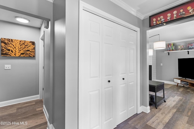 205 Sand Dollar Ln, Hampstead, NC 28443 - hall with crown molding, dark wood-type flooring, and baseboards