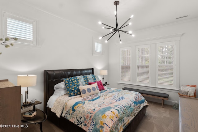 3752 Glenmere Ln, Southport, NC 28461 - bedroom with a chandelier, crown molding, and carpet floors