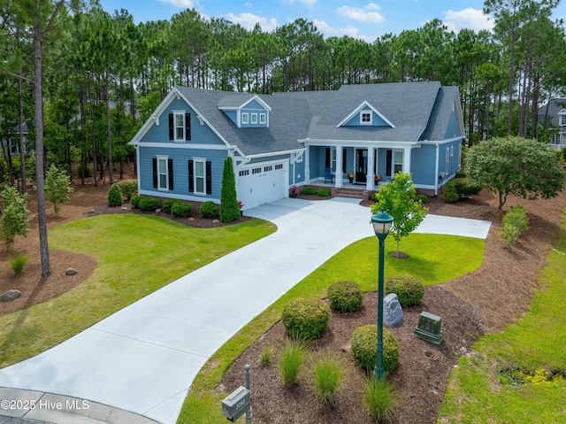 3752 Glenmere Ln, Southport, NC 28461 - view of front of home featuring covered porch, a front yard, a garage, and roof with shingles