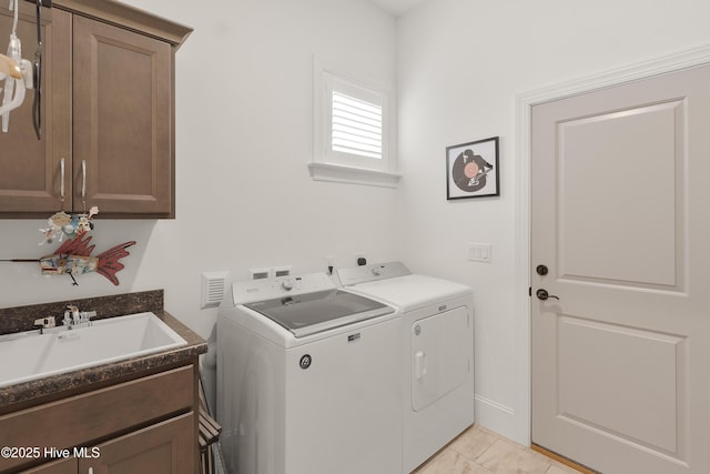 3752 Glenmere Ln, Southport, NC 28461 - washroom featuring washing machine and dryer and cabinet space