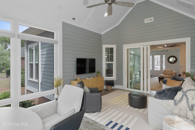 3752 Glenmere Ln, Southport, NC 28461 - living room with ceiling fan, high vaulted ceiling, and wood walls