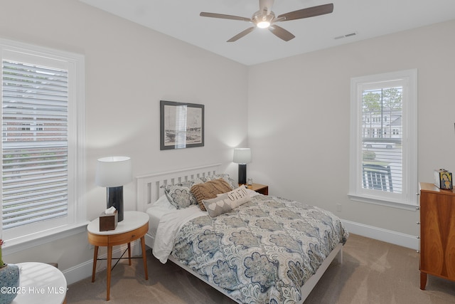 3752 Glenmere Ln, Southport, NC 28461 - carpeted bedroom with baseboards and a ceiling fan
