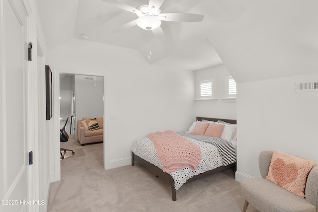 3752 Glenmere Ln, Southport, NC 28461 - bedroom featuring lofted ceiling, light colored carpet, a ceiling fan, and baseboards