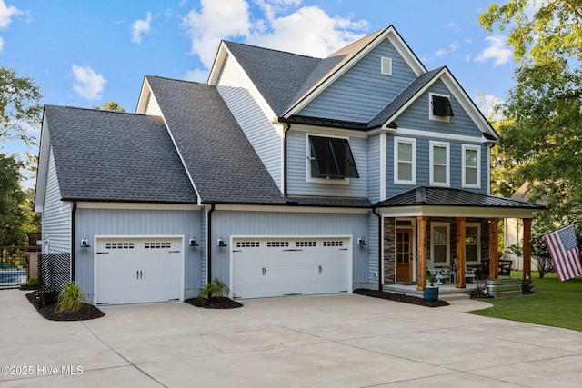 708 Cordgrass Rd, Hampstead, NC 28443 - view of front of house featuring covered porch, driveway, a standing seam roof, a shingled roof, and fence