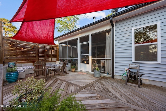 708 Cordgrass Rd, Hampstead, NC 28443 - deck with a sunroom and outdoor lounge area