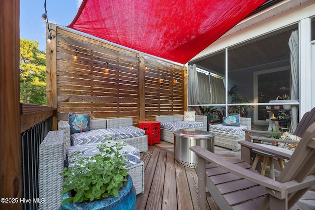 708 Cordgrass Rd, Hampstead, NC 28443 - wooden terrace with an outdoor living space and a sunroom