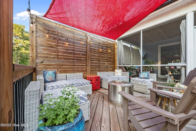 708 Cordgrass Rd, Hampstead, NC 28443 - wooden terrace featuring an outdoor hangout area and a sunroom