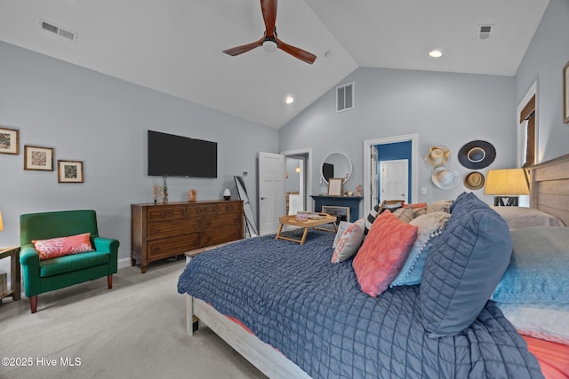 708 Cordgrass Rd, Hampstead, NC 28443 - carpeted bedroom with high vaulted ceiling, a glass covered fireplace, a ceiling fan, recessed lighting, and baseboards