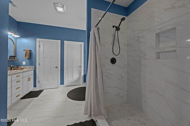 708 Cordgrass Rd, Hampstead, NC 28443 - full bath with tiled shower, vanity, and marble finish floors