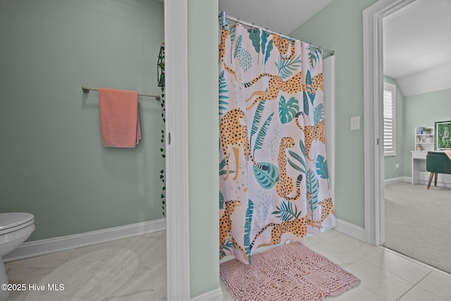 708 Cordgrass Rd, Hampstead, NC 28443 - bathroom featuring marble finish floors, toilet, a shower with shower curtain, and baseboards