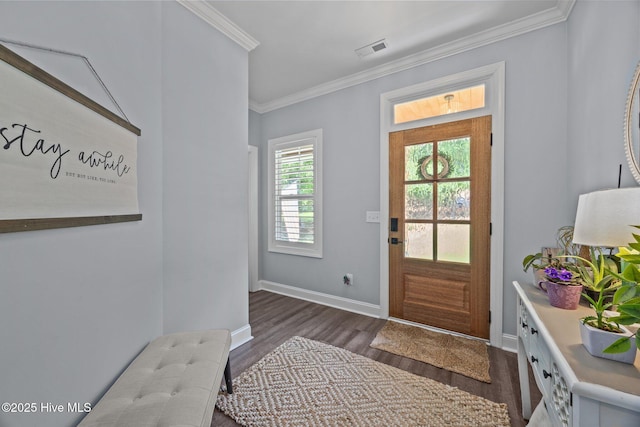 708 Cordgrass Rd, Hampstead, NC 28443 - entryway featuring ornamental molding, dark wood-type flooring, and baseboards