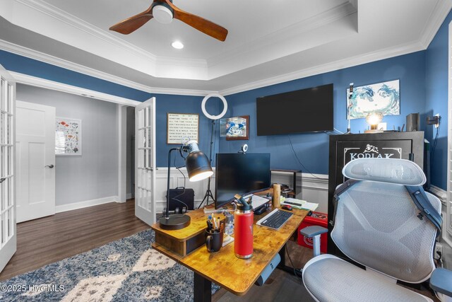 708 Cordgrass Rd, Hampstead, NC 28443 - office area with a tray ceiling, wood finished floors, ceiling fan, french doors, and ornamental molding