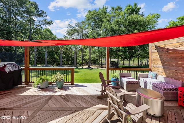 708 Cordgrass Rd, Hampstead, NC 28443 - wooden deck with grilling area and a lawn