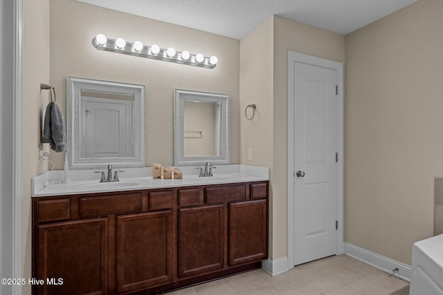 606 Spoleto Ct, Swansboro, NC 28584 - bathroom with double vanity, tile patterned floors, and baseboards
