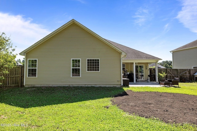606 Spoleto Ct, Swansboro, NC 28584 - back of property with a patio and central AC unit