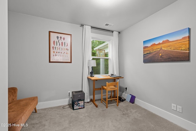 home office with carpet flooring and baseboards