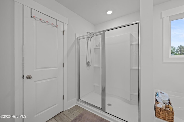 full bathroom featuring a stall shower