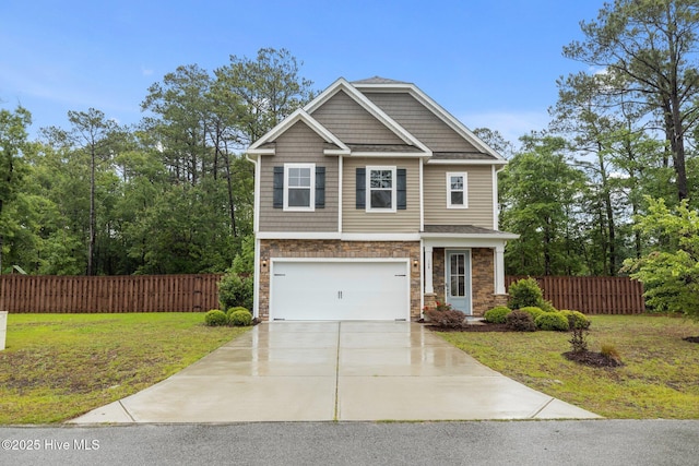 craftsman-style house featuring a garage, concrete driveway, and stone siding