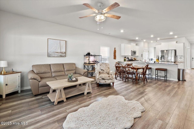 9052 Island Shore Ave, Calabash, NC 28467 - living area featuring a ceiling fan, light wood-style flooring, and recessed lighting