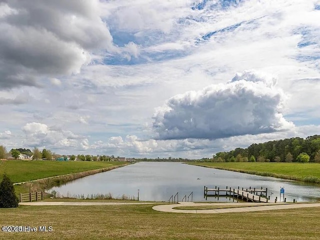 410 Isabelle St, New Bern, NC 28560 - view of property's community with a water view, a dock, and a yard