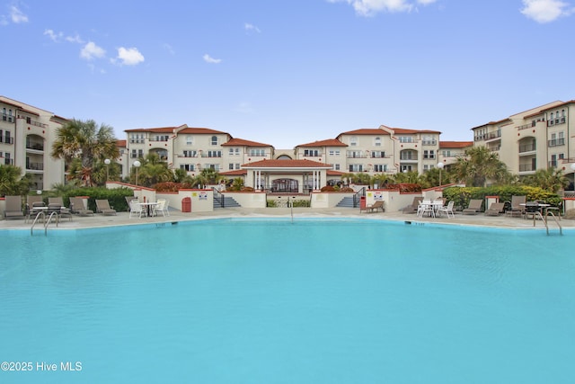 community pool featuring a patio
