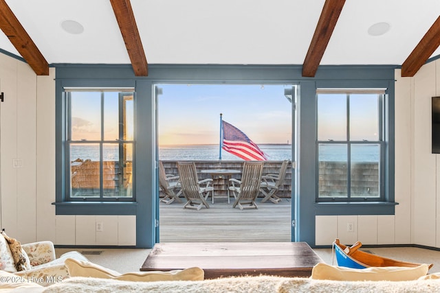 21 Sea Gull Trl, Bald Head Island, NC 28461 - deck at dusk featuring a water view and outdoor dining area
