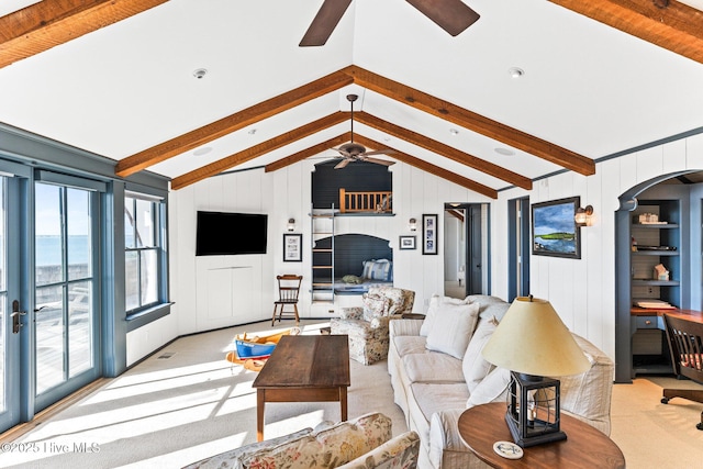 21 Sea Gull Trl, Bald Head Island, NC 28461 - living area featuring ceiling fan, arched walkways, and light carpet